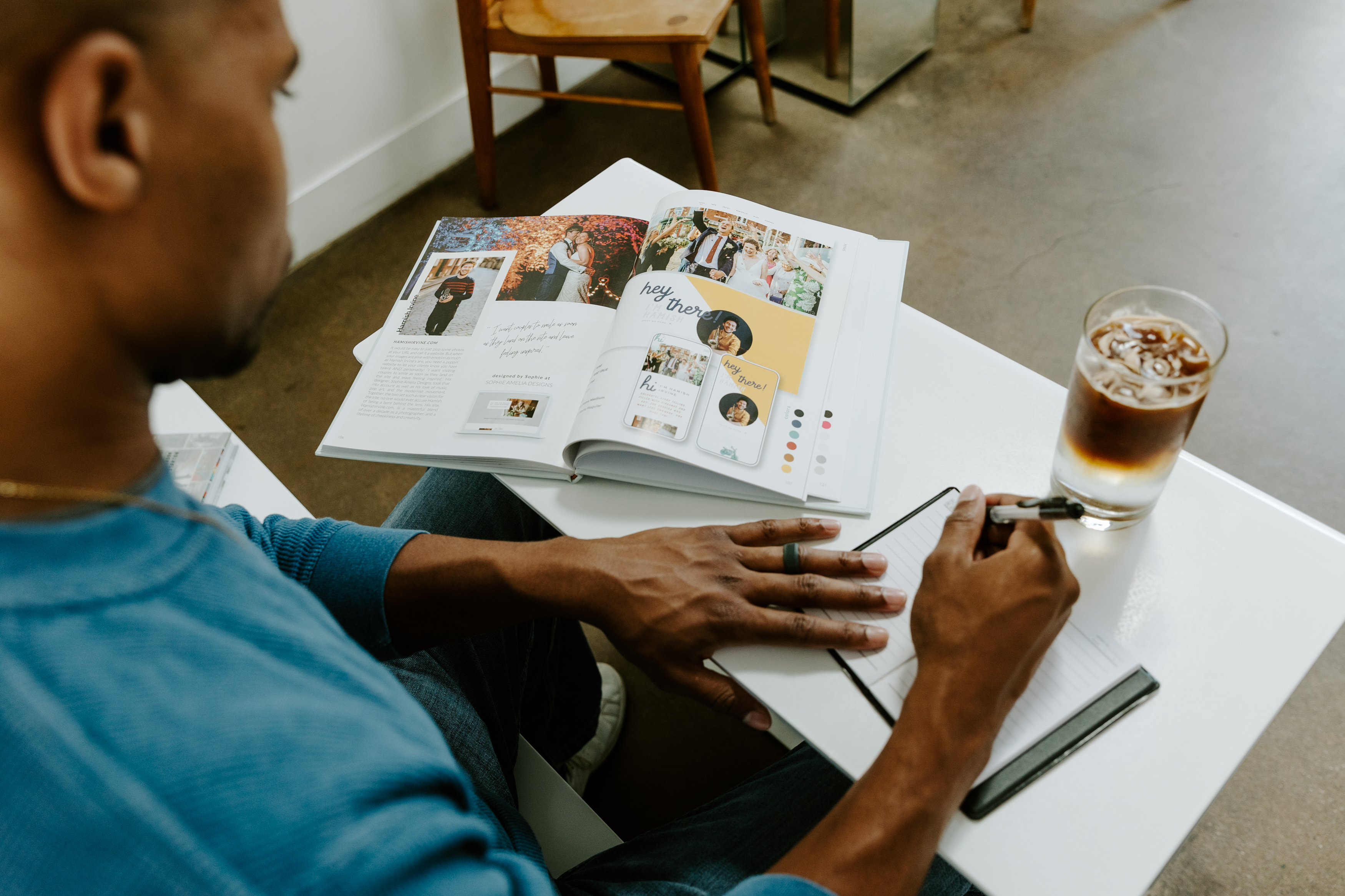 Male creative entrepreneur making a branding plan for his small business.